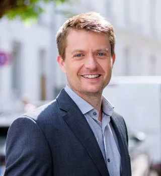 E. Timmermann